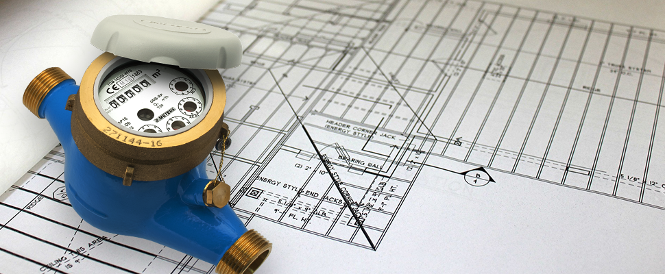 Contador de agua sobre un plano de construcción